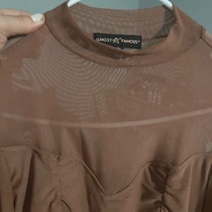 Beautiful blouse, size large with sharing on it